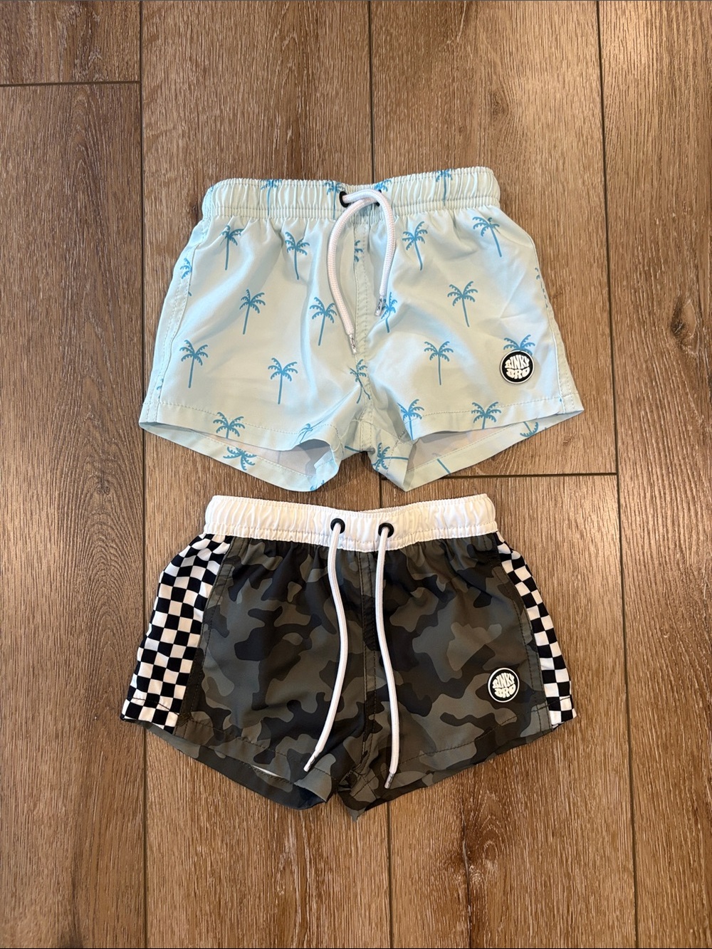 Two pairs of Binky Bros swim trunks sizs 2-3 years